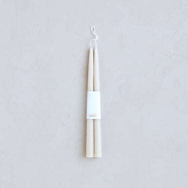 https://cdn.shopify.com/s/files/1/0562/0914/6006/products/12inchTaperCandles_Parchment_White12.jpg?v=1741874804