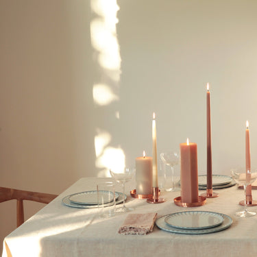 https://cdn.shopify.com/s/files/1/0562/0914/6006/products/Dippedtapercandlesmutedcolors.Pillarcandles.jpg?v=1741874804