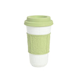 https://bernardaud-prod.s3.eu-west-3.amazonaws.com/single_variant_products/images/000/012/589/original/Louvre_MugNomade_Vert.jpg?1743692645