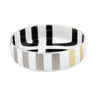 A small bowl with a striped black and white watercolor design and gold accents, part of the Vista Alegre by Christian Lacroix collection.